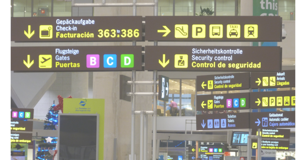 飛行機移動時はカウンターで預ける注意を示すイメージ