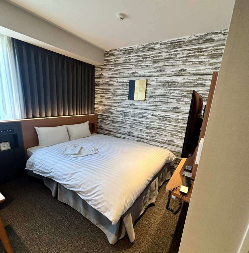 京成ホテルミラマーレ アネックス館の客室・ベッドとソファ